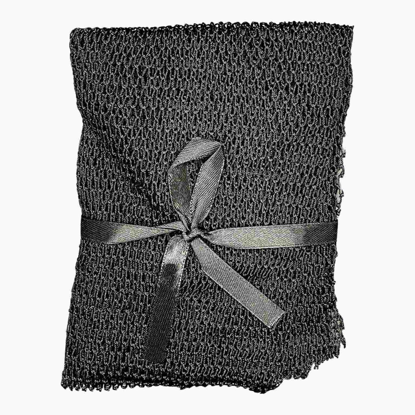 Flat image of a black shower exfoliation net wrapped in a black bow - Sincerely Sanguine